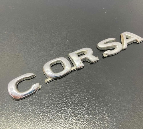 Emblema Corsa Capô Traseiro Gm Corsa Wagon 1999