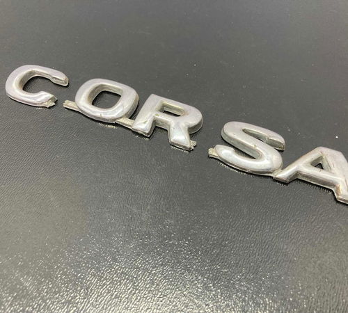 Emblema Corsa Capô Traseiro Gm Corsa Wagon 1999