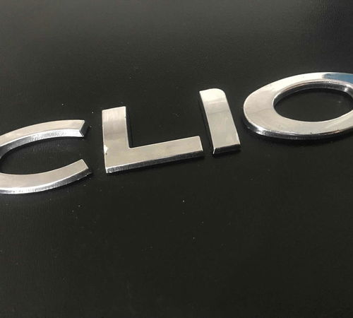 Emblema Clio Capô Traseiro Renault Clio 2015