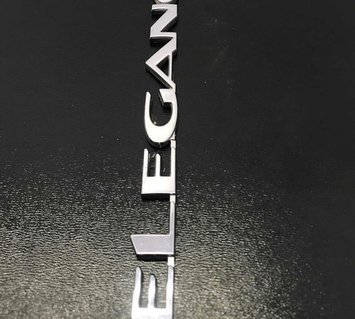 Emblema ( Elegance ) Porta Dianteira Direita Gm Vectra 06/12