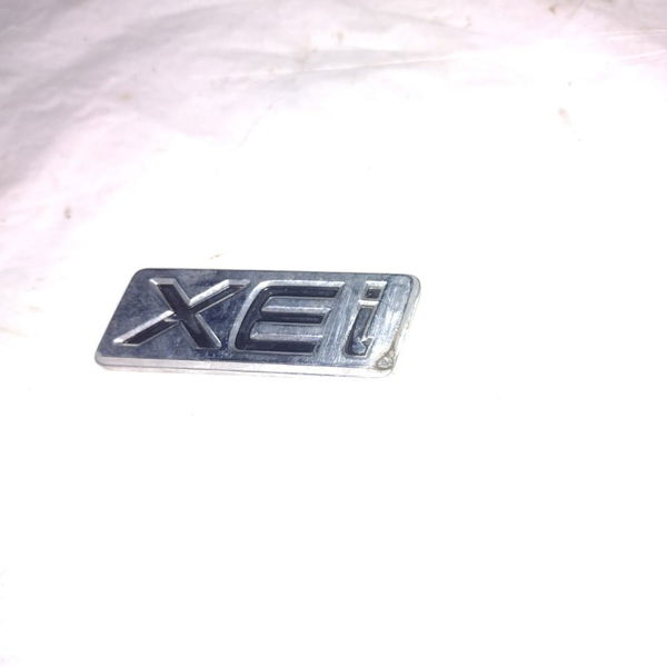 Emblema Xei Tampa Traseira Toyota Corolla 2016