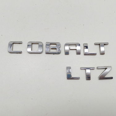 Escrita Logo Da Tampa Traseira Chevrolet Cobalt 1.8 Ltz 2015