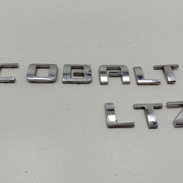 Escrita Logo Da Tampa Traseira Chevrolet Cobalt 1.8 Ltz 2015