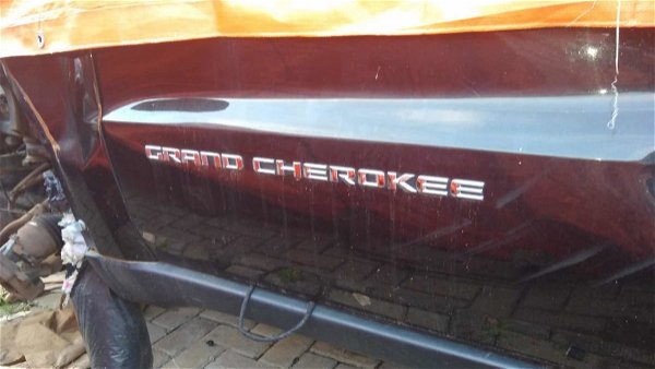 Escrito Porta Jeep Grand Cherokee